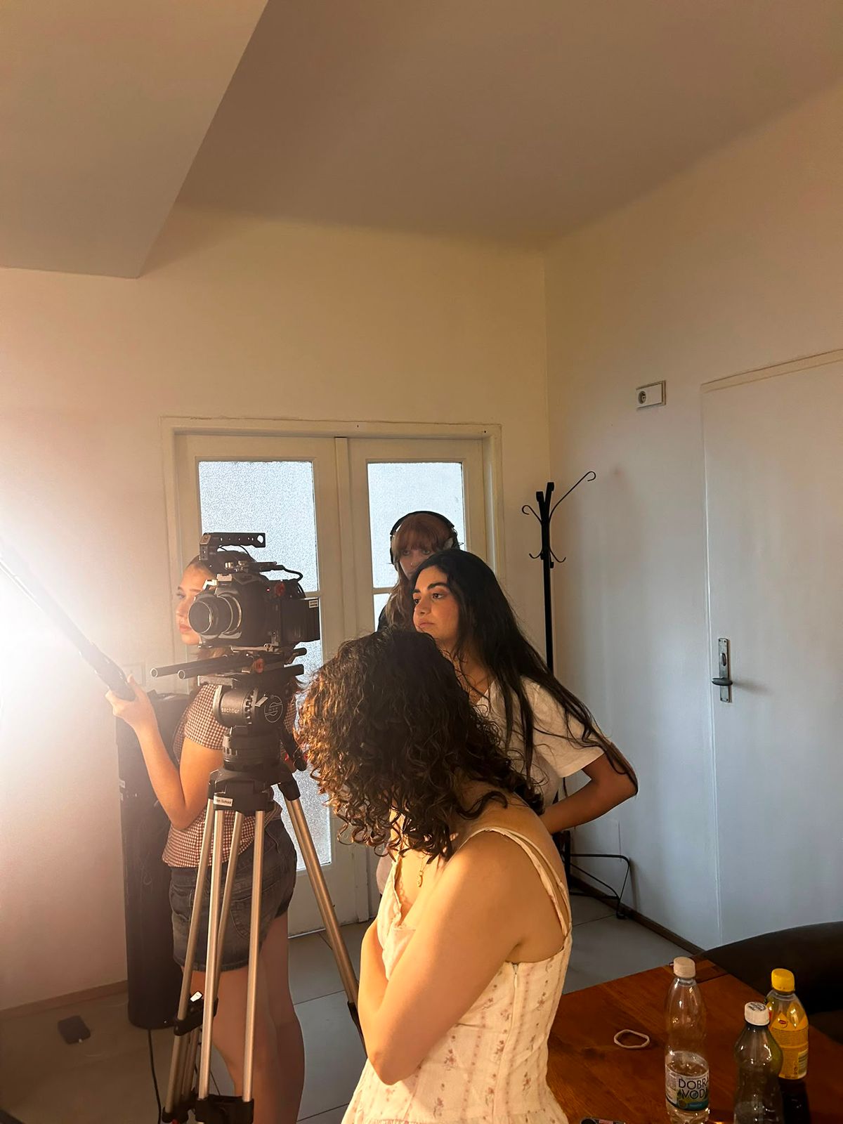 Film crew rehearsing a camera setup for Soi